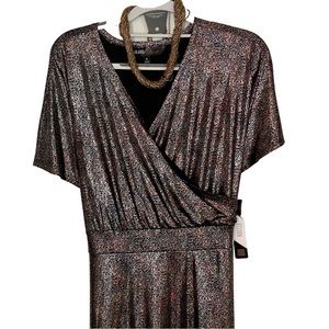 LuLaRoe at its best with Elegant Noelle XL-subtle shimmer! Tie for comfort!